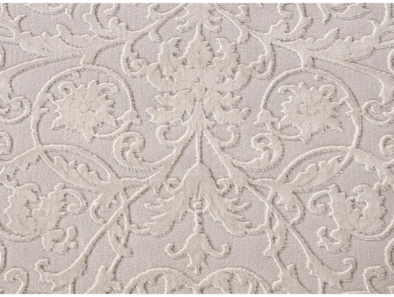 Detaliu textura covor crem cu model fin, material placut la atingere si confortabil