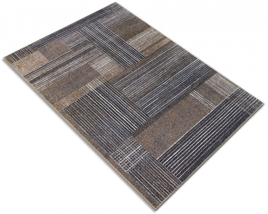 Covor geometric modern pentru living in nuante bej si gri, potrivit pentru decor contemporan