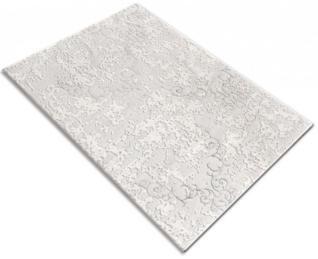 Covor modern alb cu design elegant si textura fina, potrivit pentru spatii moderne si aerisite