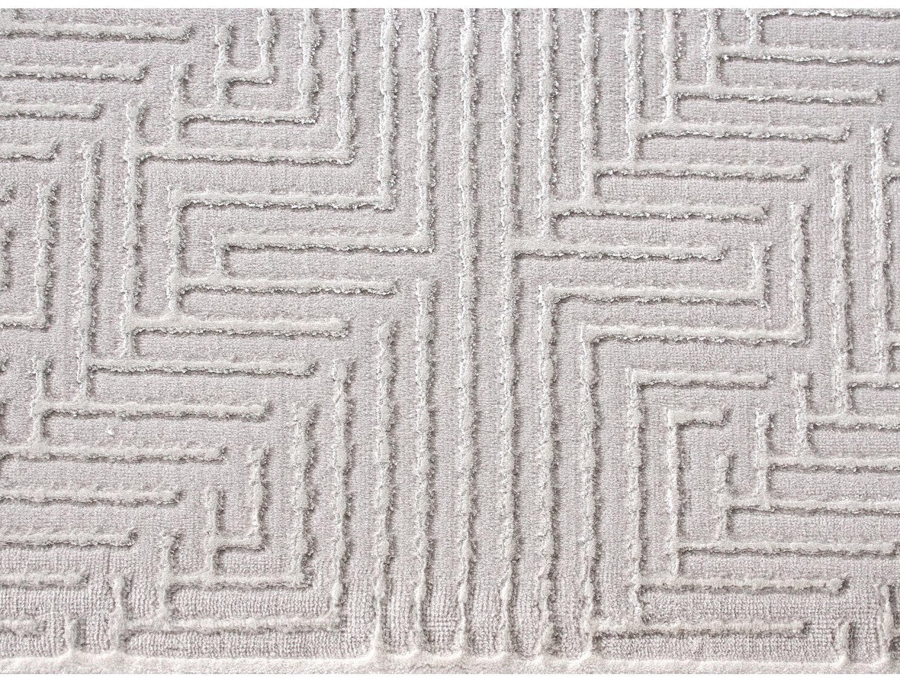 Detaliu textura geometrica covor alb modern, fibre moi si confortabile