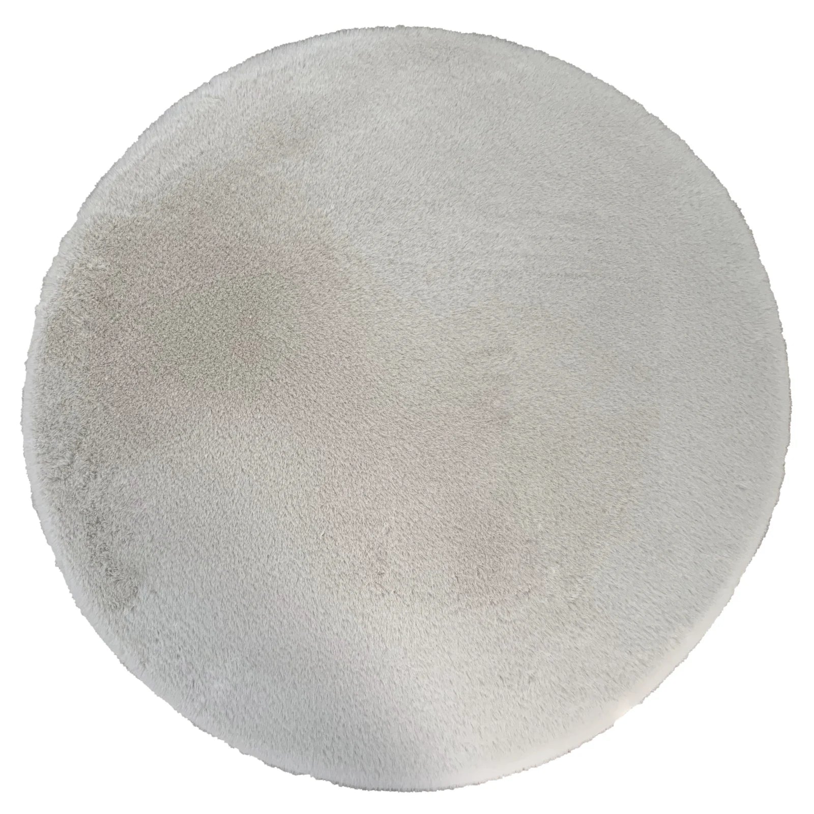 Covor pufos crem tip blanita, textura fina si placuta la atingere, ideal pentru confort si relaxare