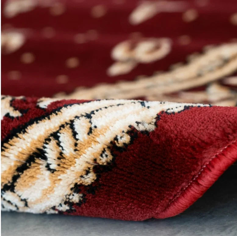 Detaliu material covor bisericesc oval grena cu crini