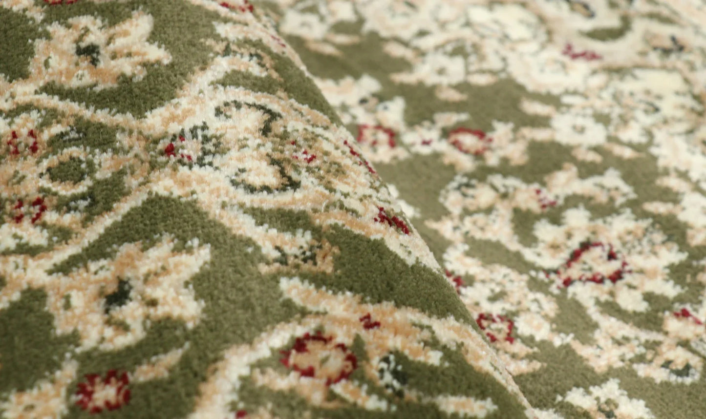 Detaliu model floral pe covor clasic verde