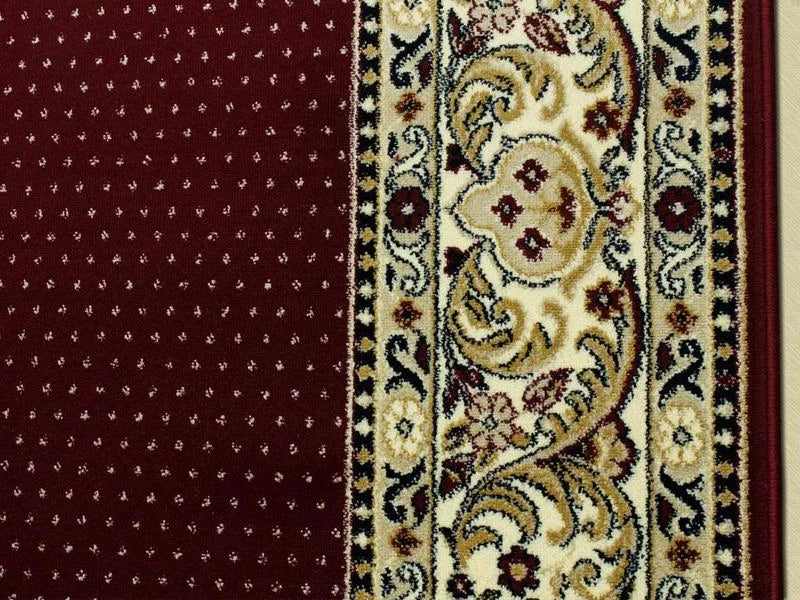 Traversa rosu inchis cu model punctat si bordura traditionala eleganta